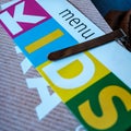 Colourful Kids Or Childrens Menu On A Restaurant Table