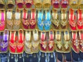 Colourful ladies sandals on shoe shop rack