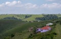 Colourful painted Zulu mud huts / rondavels in rural Kwazulu Natal, Wild Coast, South Africa Royalty Free Stock Photo