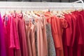 Colourful line of formal dresses on the Aibon stand during Momad 2023 Madrid Spain