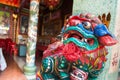 Colourful lion guardian at the entrance to a Chinese temple in Bangkok, Thailand Royalty Free Stock Photo