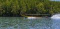 A colourful longtail speed boat heading out to Phang Nga Bay, Thailand Royalty Free Stock Photo