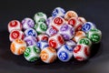 Colourful lottery balls in a machine