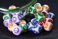 Colourful lottery balls in a machine Royalty Free Stock Photo