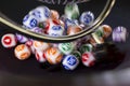 Colourful lottery balls in a machine Royalty Free Stock Photo