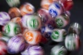Colourful lottery balls in a machine Royalty Free Stock Photo