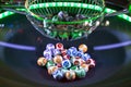 Colourful lottery balls in a machine Royalty Free Stock Photo