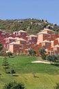 Colourful luxury houses and apartments on Duquesa golf course in Royalty Free Stock Photo