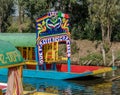 Colourful Mexican boats at Xochimilcos Floating Gardens - Mexico City, Mexico