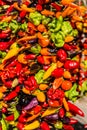 Colourful mixed peppers on display on market day.