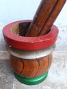 Colourful mortar pestle made up of wood.