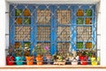 Colourful window with many different flowers and pots Royalty Free Stock Photo