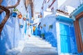 Colourful narrow street in the medina, Chefchaouen, Morocco