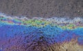 Colourful Oil Layers on Tar Road near Satara,Maharashtra,India Royalty Free Stock Photo