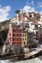 Colourful old houses, dock and boats in fisherman village Riomaggiore, Cinque Terre, Liguria, Italy Royalty Free Stock Photo