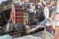 Colourful old houses, dock and boats in Riomaggiore fisherman village, Cinque Terre, Liguria, Italy Royalty Free Stock Photo