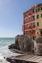 Colourful old houses and dock of Riomaggiore fisherman village, Cinque Terre, Liguria, Italy Royalty Free Stock Photo