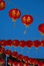 Orange lanterns hanging across Gerrard Street in Chinatown, to celebrate the Chinese New Year, London UK Royalty Free Stock Photo