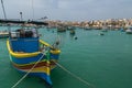 Colourful painted fishing boats in the harbour of Marsaxlokk, Ma Royalty Free Stock Photo