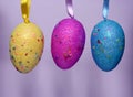 Colourful panted plastic easter eggs with sparkling dots