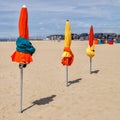 Colourful parasols on Deauville Beach. Normandy, Northern France. Royalty Free Stock Photo