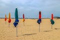Colourful parasols on Deauville Beach. Normandy, Northern France. Royalty Free Stock Photo