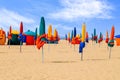 Colourful parasols, landmark of Deauville Beach, resort in Normandy, Northern France. Summer holidays. Royalty Free Stock Photo