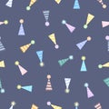 Colourful party hat seamless pattern, on a blue background. Decorative vector design