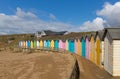 Colourful pastel beach huts on the beach Bude North Cornwall England uk