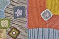 Colourful patchwork abstract background. Different pieces, knitted and crocheted are into one canvas Royalty Free Stock Photo