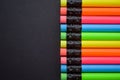 Colourful pencils with rubber eraser on the black background. Group of new unsharp pencils with rubber eraser. Bunch of multi