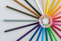 Colourful pencils on a table in a circle Royalty Free Stock Photo