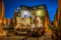 A colourful picturesque restaurant illuminated at night in the old town