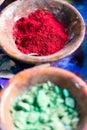 Colourful pigment powders in clay pots Royalty Free Stock Photo