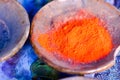 Colourful pigment powders in clay pots