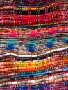 Colourful pile of locally made blankets