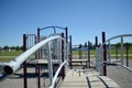 Colourful playground bridge and hand rail in school yard Royalty Free Stock Photo