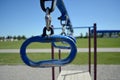 Colourful playground handles in school yard with focus on handle Royalty Free Stock Photo