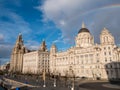 A colourful rainbow spans over The Royal Liver Building.