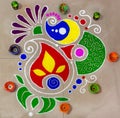 Colourful rangoli wit h deepak Royalty Free Stock Photo