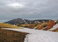 Colourful rhyolite mountains under snow, Laugavegur hiking trail, Fjallabak Nature Reserve, Highlands of Iceland, Europe Royalty Free Stock Photo