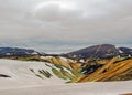 Colourful rhyolite mountains under snow, Laugavegur hiking trail, Fjallabak Nature Reserve, Highlands of Iceland, Europe Royalty Free Stock Photo