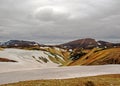 Colourful rhyolite mountains under snow, Laugavegur hiking trail, Fjallabak Nature Reserve, Highlands of Iceland, Europe Royalty Free Stock Photo