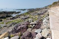 Colourful rocks Portwrinkle Whitsand Bay Cornwall England
