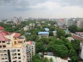 The colourful rooftops and greeen trees of the Yangin skyline Royalty Free Stock Photo
