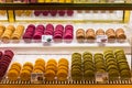 Macarons on display in a French patisserie. Paris, France