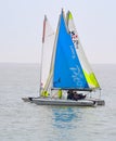 Colourful Sailing Dinghies on the North Sea at Felixstowe Suffolk England.