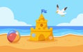 Colourful sandcastle on sunny beach Royalty Free Stock Photo