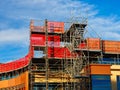 Colourful Scaffolding Cladding on Building Site Royalty Free Stock Photo