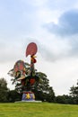 Colourful sculpture by Joana Vasconcelos in scenic YSP surroundings. Royalty Free Stock Photo